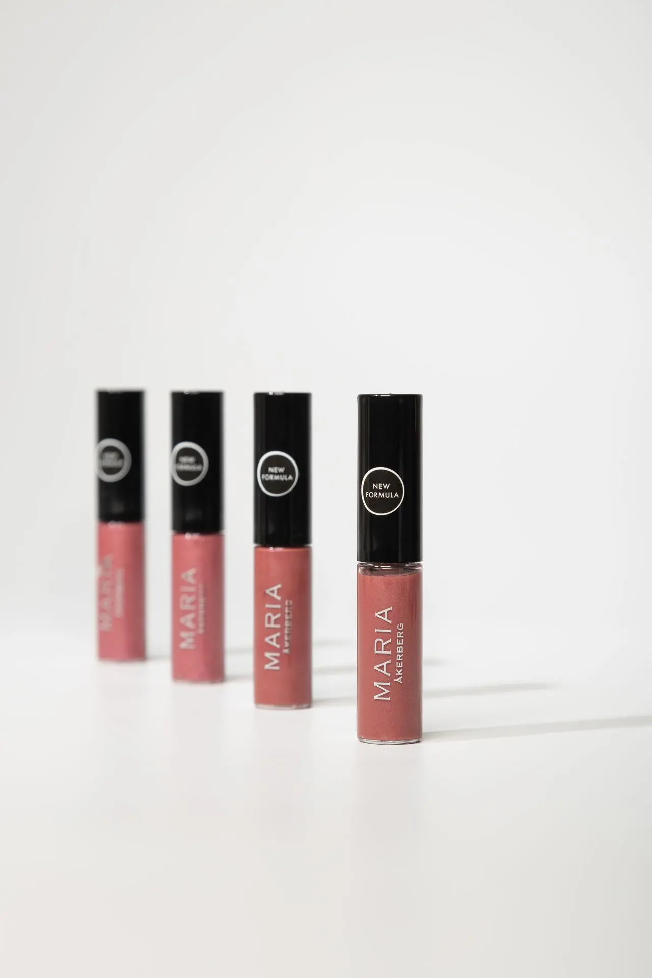 Läppglans som ger glansiga och återfuktade läppar